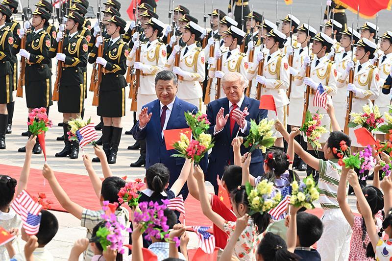△2026年5月14日上午，习近平主席在北京人民大会堂同来华进行国事访问的美国总统特朗普举行会谈。会谈前，习近平主席在人民大会堂东门外广场为特朗普总统举行欢迎仪式。