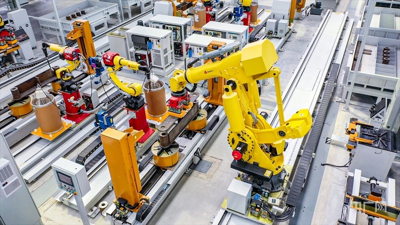 在位于西咸新区的一家智能制造产业园内，自动化设备正在高效作业（央广网发 西咸新区管委会供图）