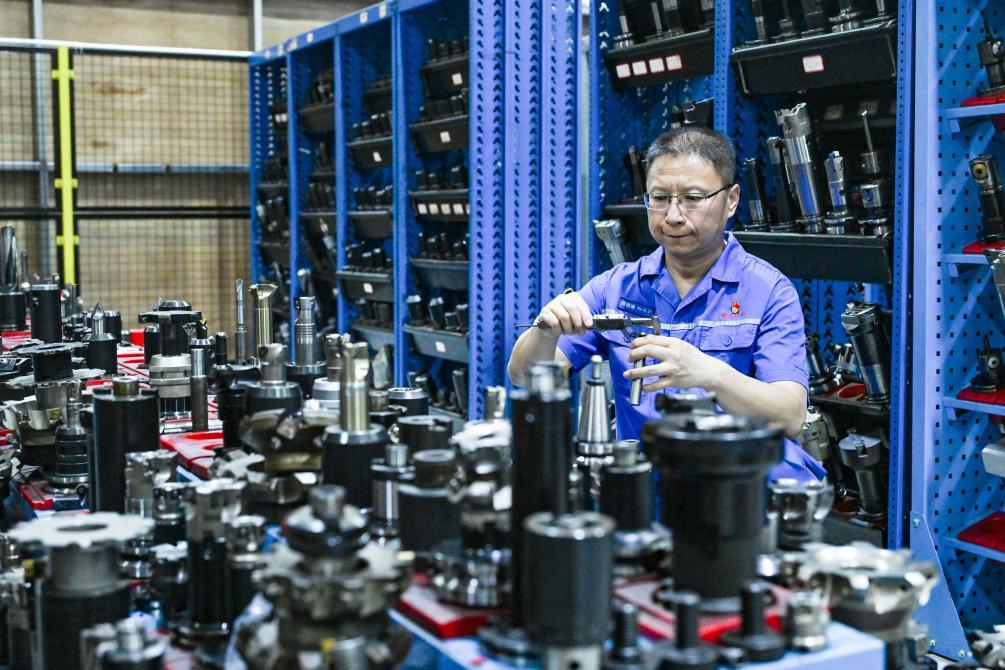 2025年5月23日，傅国涛在重庆红江机械有限责任公司生产车间作业。新华社记者 王全超 摄