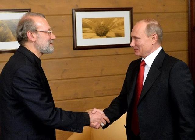 普京会见拉里贾尼