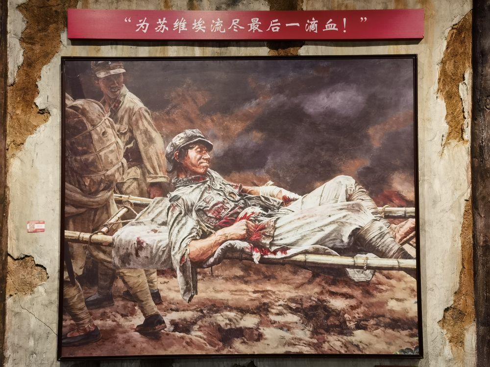 ↑这是8月2日在广西全州红军长征湘江战役纪念馆拍摄的油画《陈树湘》。新华社记者丁增义摄