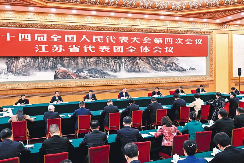 2026年3月5日下午，中共中央总书记、国家主席、中央军委主席习近平参加他所在的十四届全国人大四次会议江苏代表团审议。 新华社记者 殷博古/摄