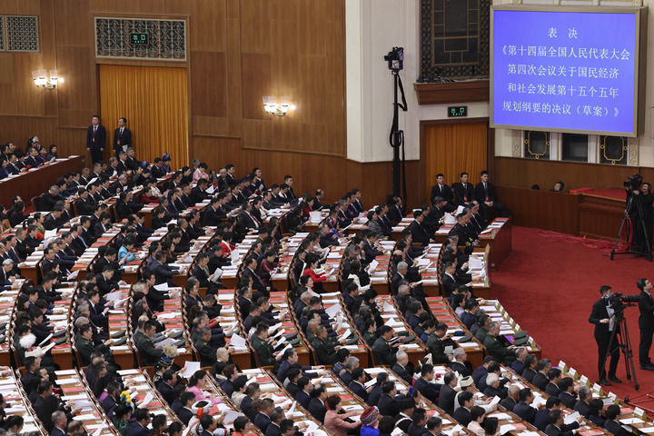 2026年3月12日,第十四届全国人民代表大会第四次会议在北京人民大会堂举行闭幕会。新华社记者 金立旺 摄