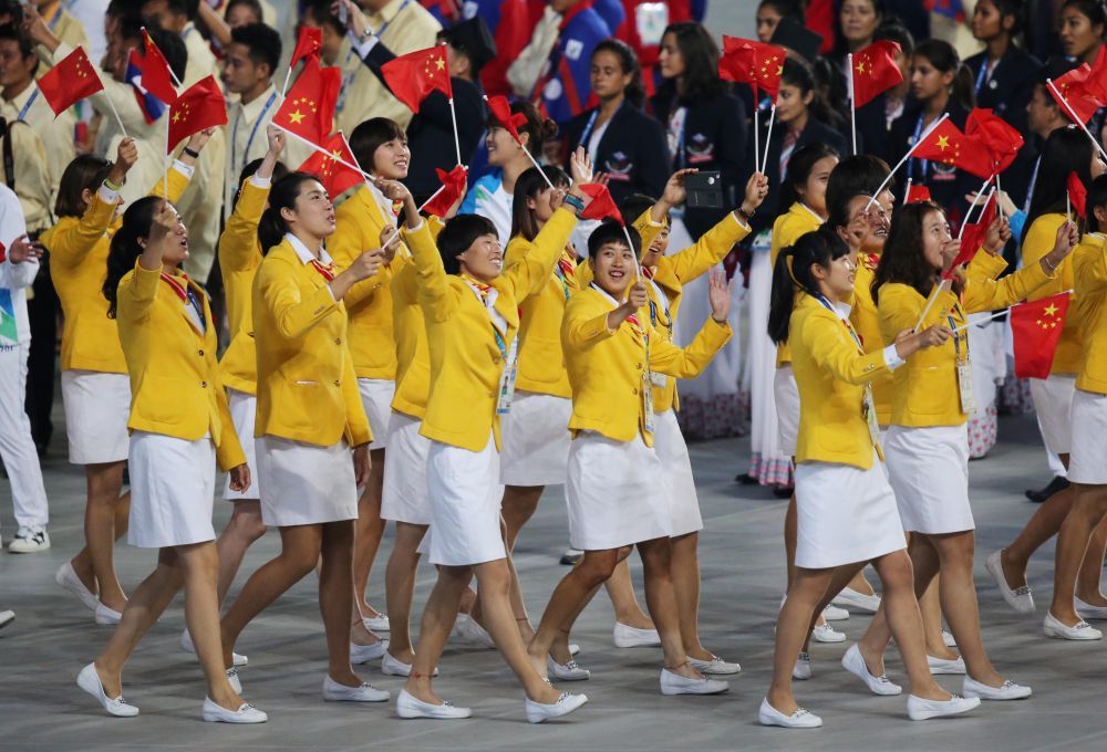2014年9月19日,第17届亚洲运动会开幕式在韩国仁川亚运会主体育场举行。这是中国体育代表团入场。 新华社记者 孟永民 摄