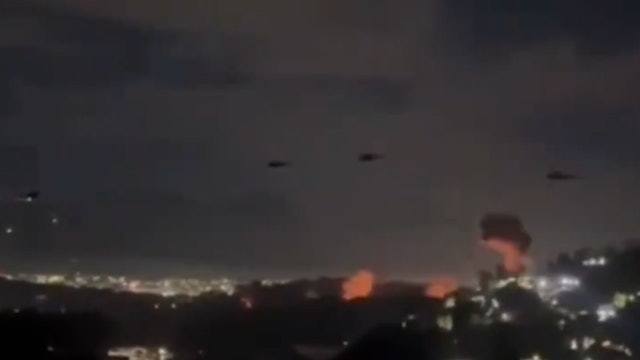 据称是美军直升机飞入加拉加斯的画面