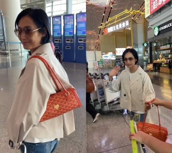 54岁童年女神朱茵素颜现身机场 发型造型被指老土