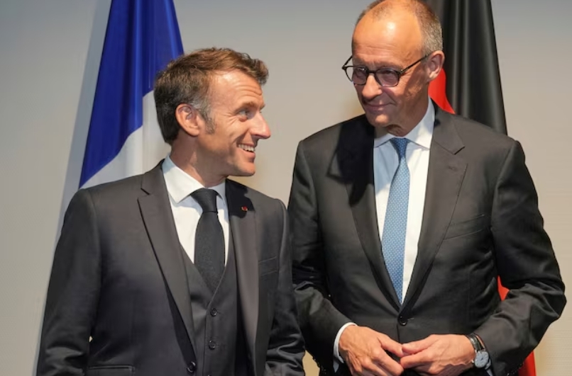 马克龙和默茨 视觉中国