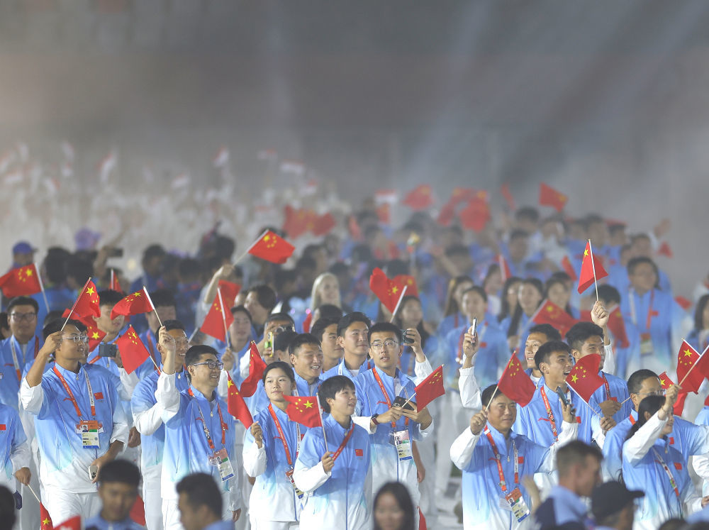 10月4日,中国代表团在闭幕式上。新华社记者 伍志尊 摄