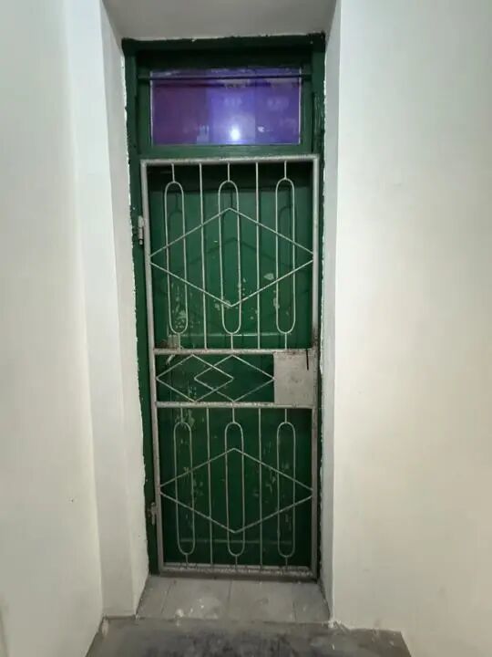 巫清家风格老旧的门。 受访者供图