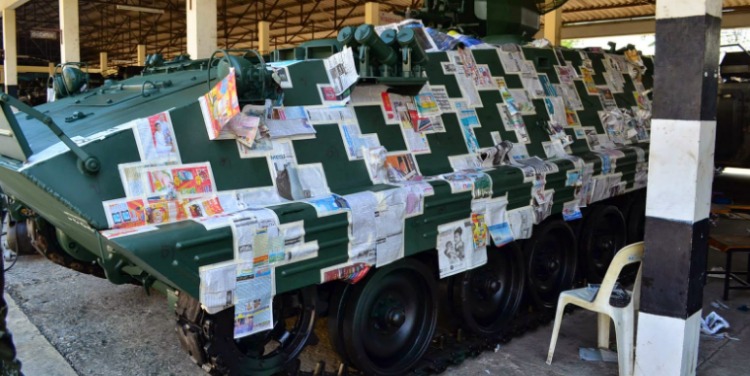 泰军用报纸给中国造装甲车换“迷彩装”