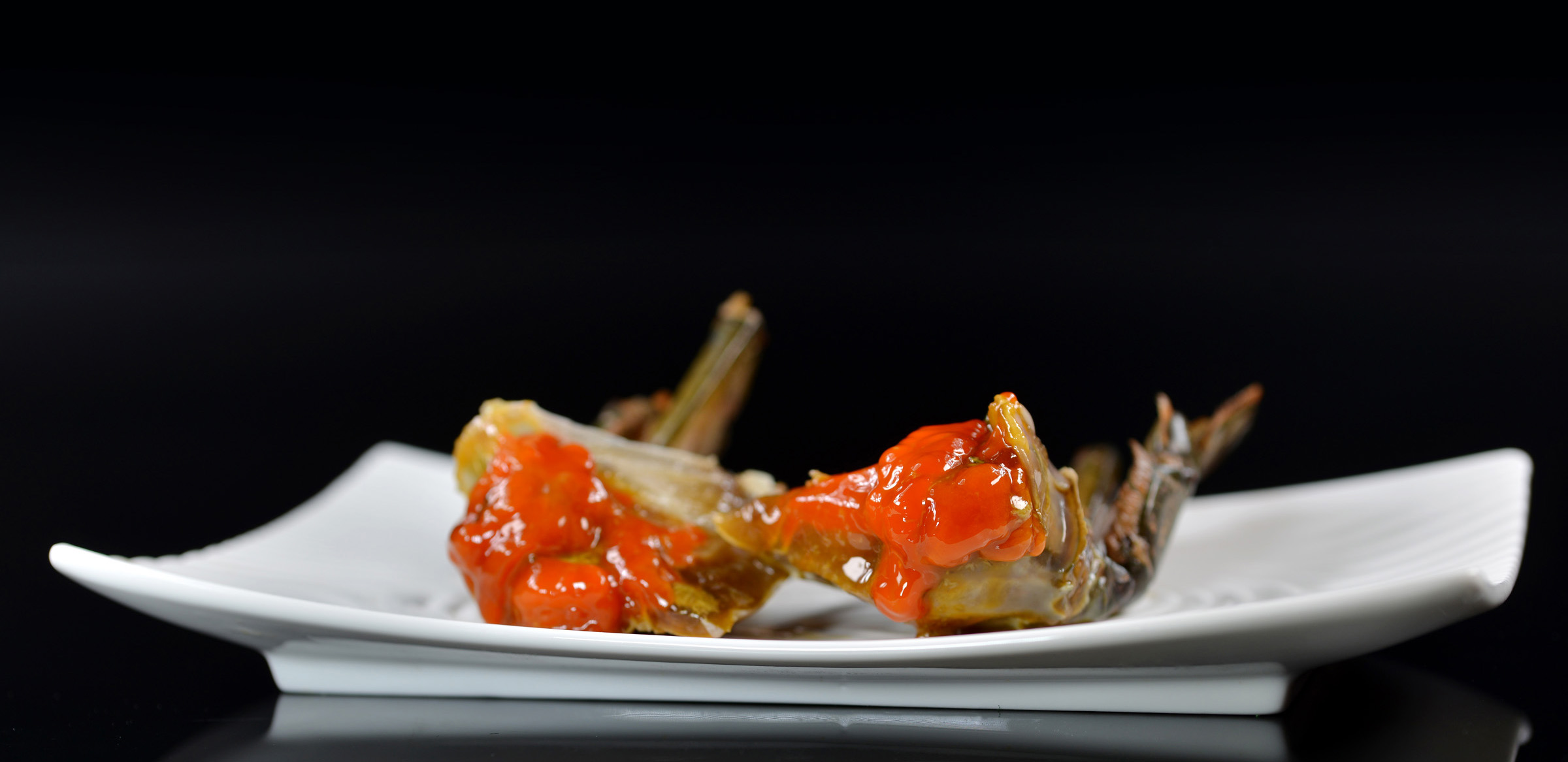 秘制腌膏蟹 潮汕人将此类腌制品戏称为毒药,意思是一旦品尝过,就会