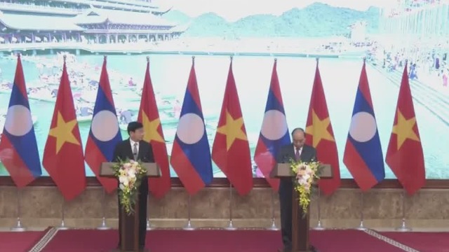 老挝总理访问越南 越总理:越老将深化合作加强经济互补