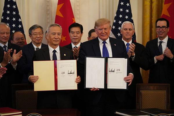中美经贸协议写入李克强政府工作报告 释放特殊信号