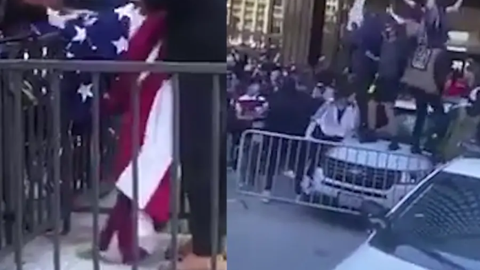 芝加哥特朗普大厦被抗议者占领 美国国旗也被扔下河