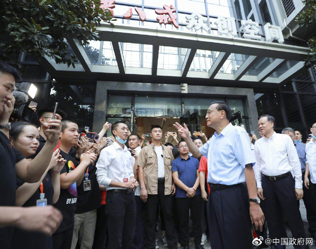 李克强在重庆考察猪八戒网络有限公司
