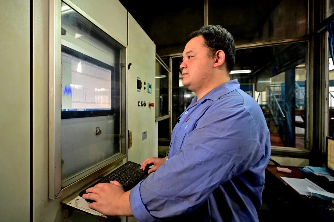 罗宇航焊花里的数字人生