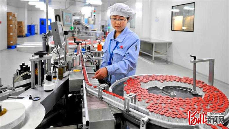 图为华北制药华民公司包装生产线。华北制药供片