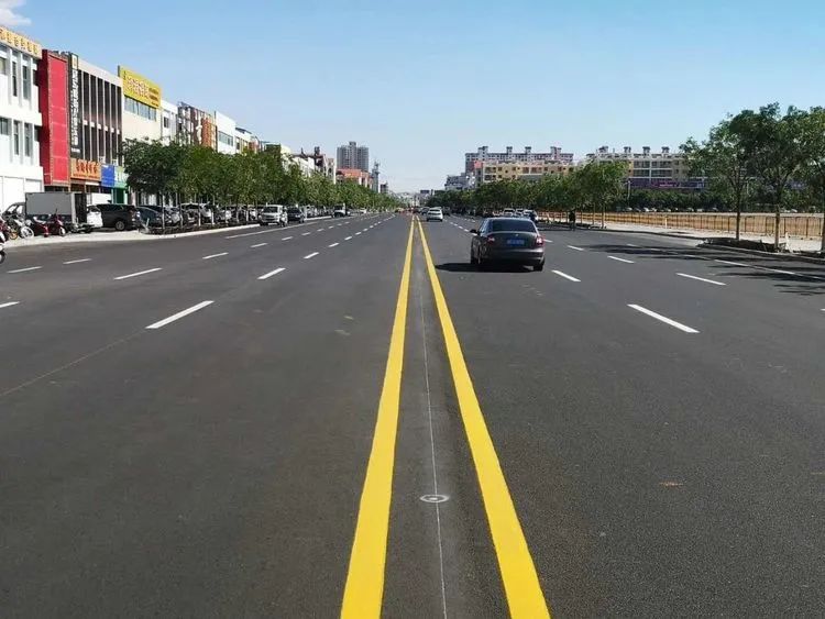 雨中守护者城市清道夫 金昌“橙色精灵”清淤忙