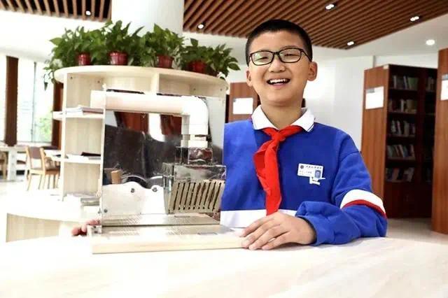 张荣景和他的小发明“防倒灌油烟装置”