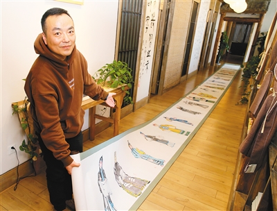 西安一位美术老师宁小勇创作了18米的中国画彩墨长卷