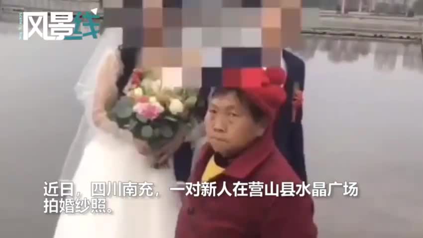 新人喜拍婚纱照  69岁老太全程跟随强行“讨喜钱”被拘