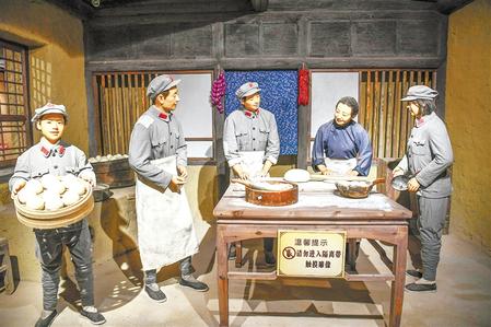 纪念馆内的雕塑再现了“军民鱼水情”的场景