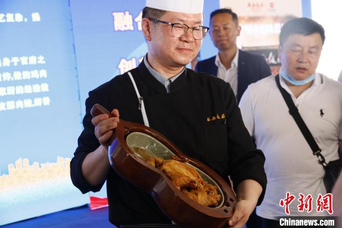 第五届丝博会陕菜国际美食文化节开幕。　陕西省商务厅供图 