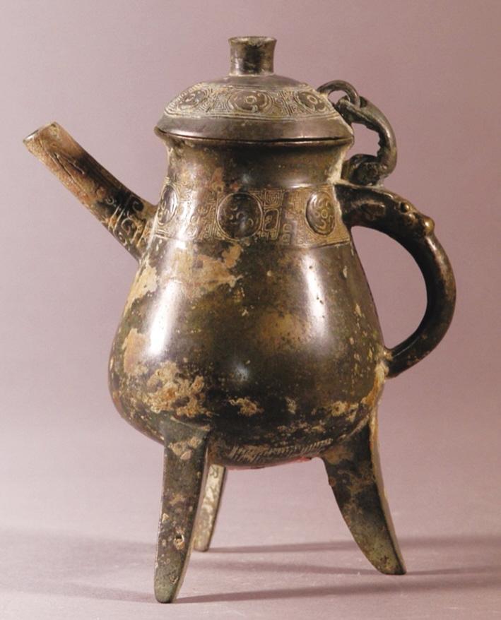 夔涡纹祖癸乙三锥足青铜盉