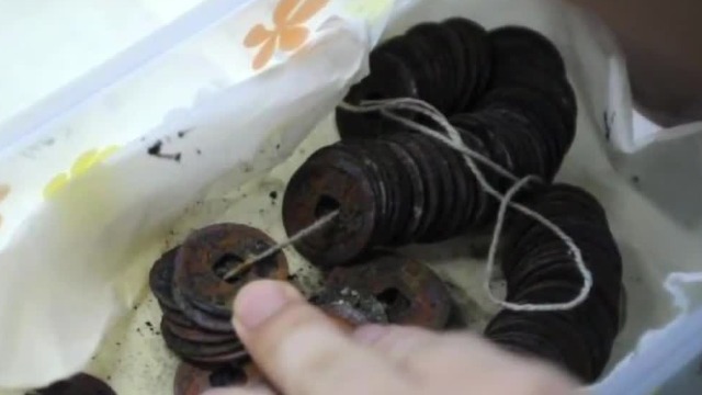 “南海一号”当时沉入海底，是因为当时船上的铜钱吗？