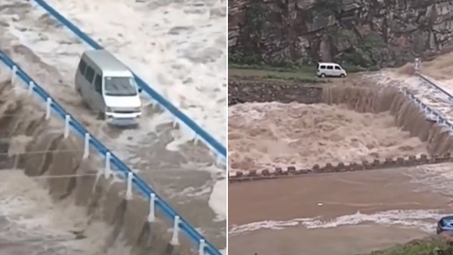 男子驱车遇洪水 不顾路滑山坡激流强通行