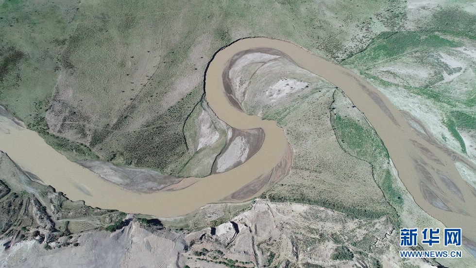 这是瓜州境内的疏勒河（2021年7月5日摄，无人机照片）。新华社记者 刘诗平 摄