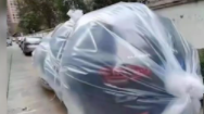 女子自制汽车保护罩防台风 网友：你就不怕漂走？