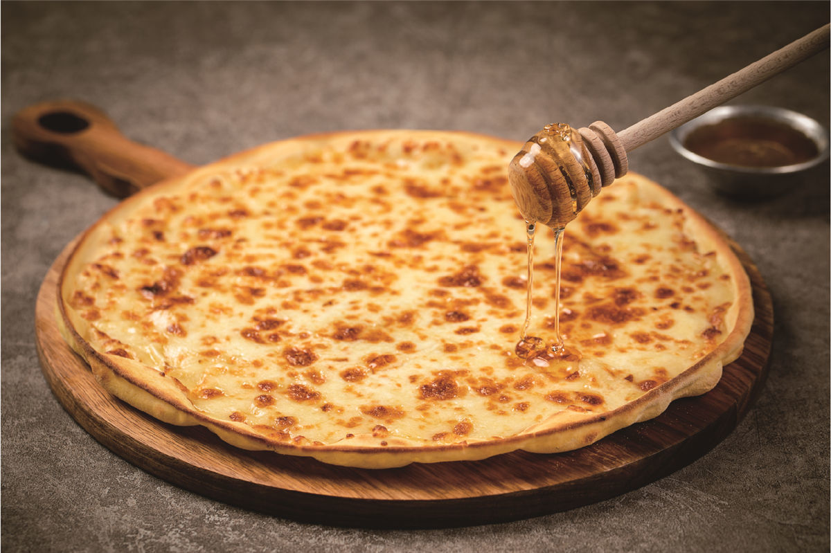 薄饼披萨专家飞麦披萨全球首发只为美食的传承