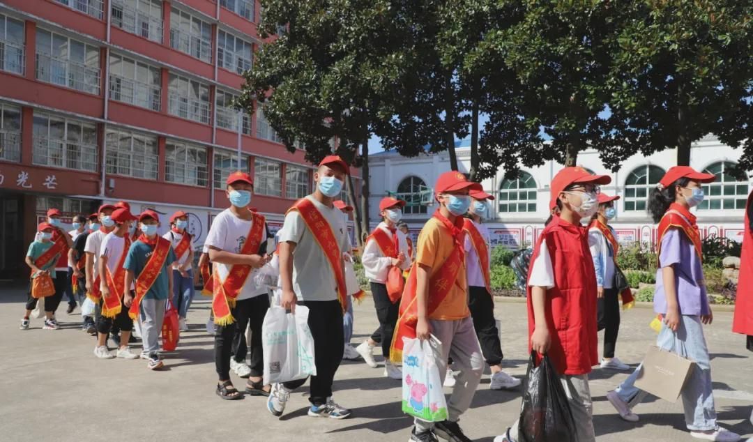 爱似明月情暖中秋信阳市第九中学走进特殊教育学校送去节日温暖