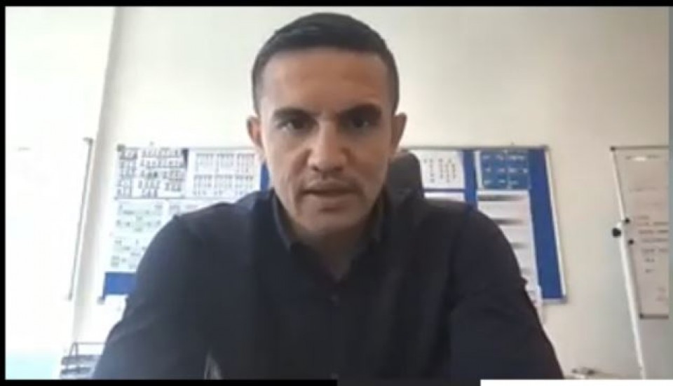 A person in a black shirtDescription automatically generated with medium confidence