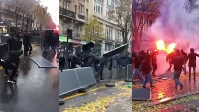 法国街头暴乱：警察被黑衣人追着打 举盾牌不断后撤