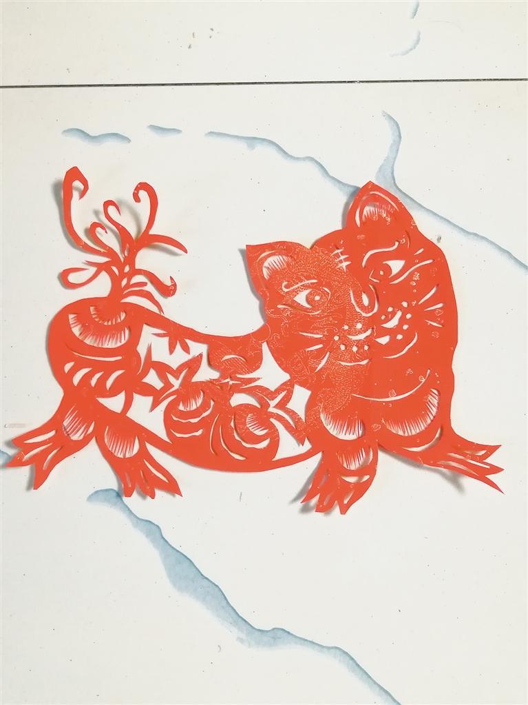惠延林创作的《石榴虎》