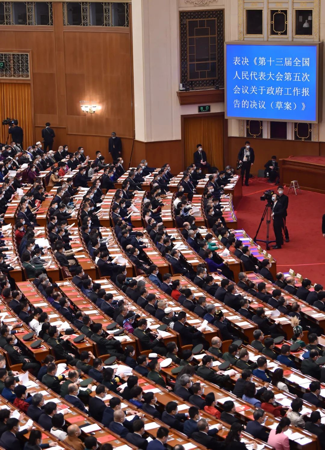 3月11日，第十三届全国人民代表大会第五次会议在北京人民大会堂举行闭幕会。新华社记者 陈钟昊 摄