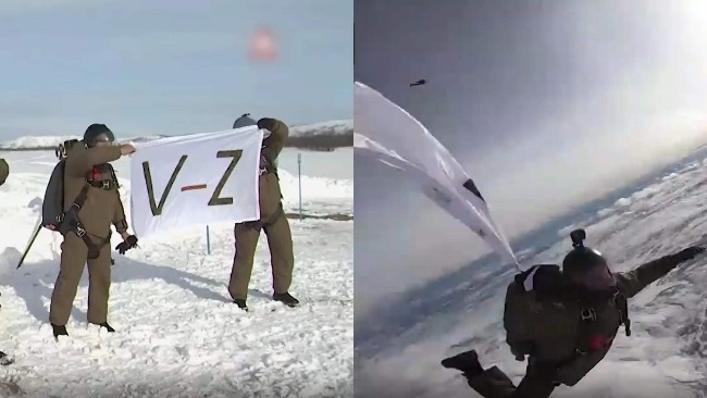 俄海军陆战队声援在乌俄军：手持“V-Z”旗帜 3千米高空集体跳伞