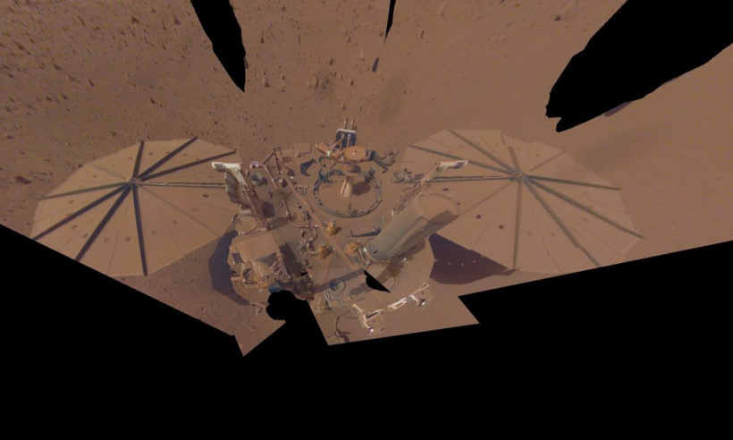NASA's InSight lander took this final selfie on April 24, 2022. The lander is covered with far more dust than it was in its first selfie, taken in December 2018, or in its second selfie, taken in March and April of 2019.