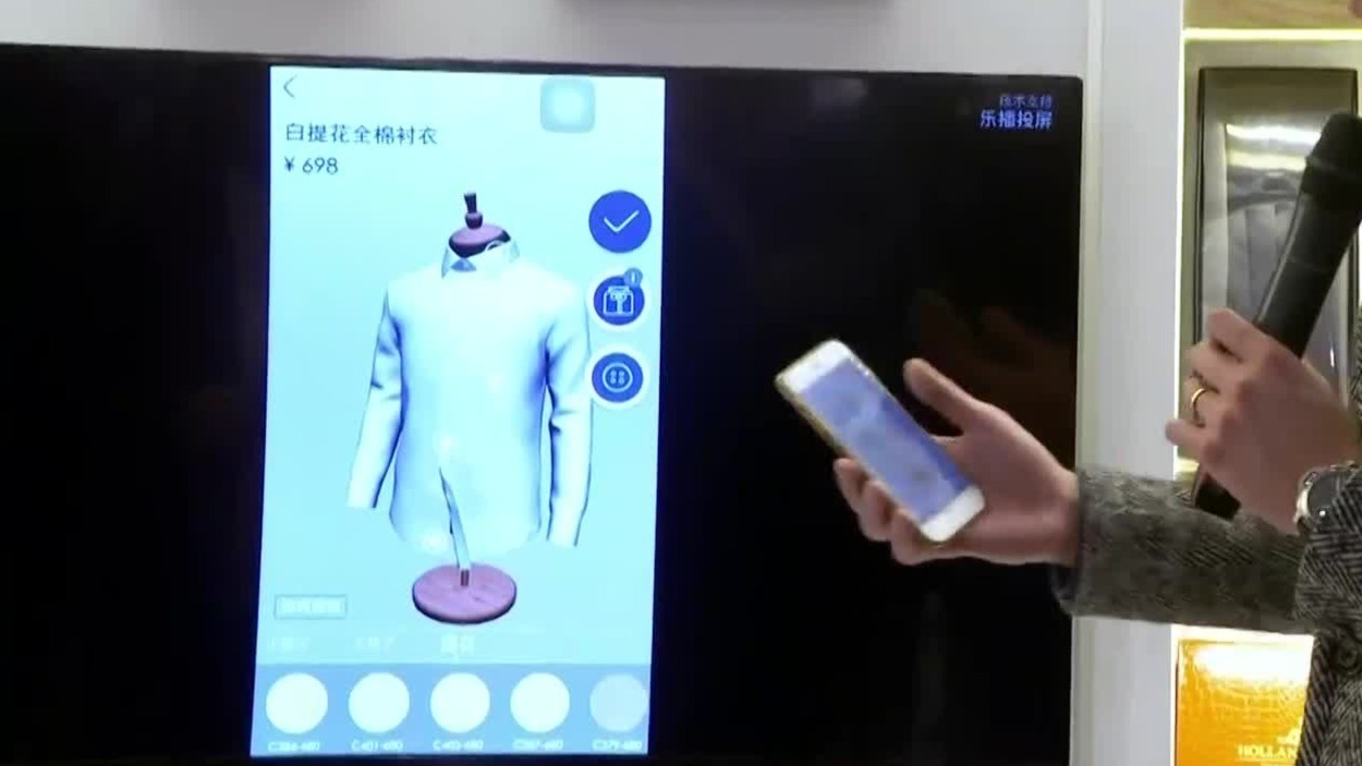 王大孟用近四年时间投入一千多万元，开发了一款男装私人订制的手机APP