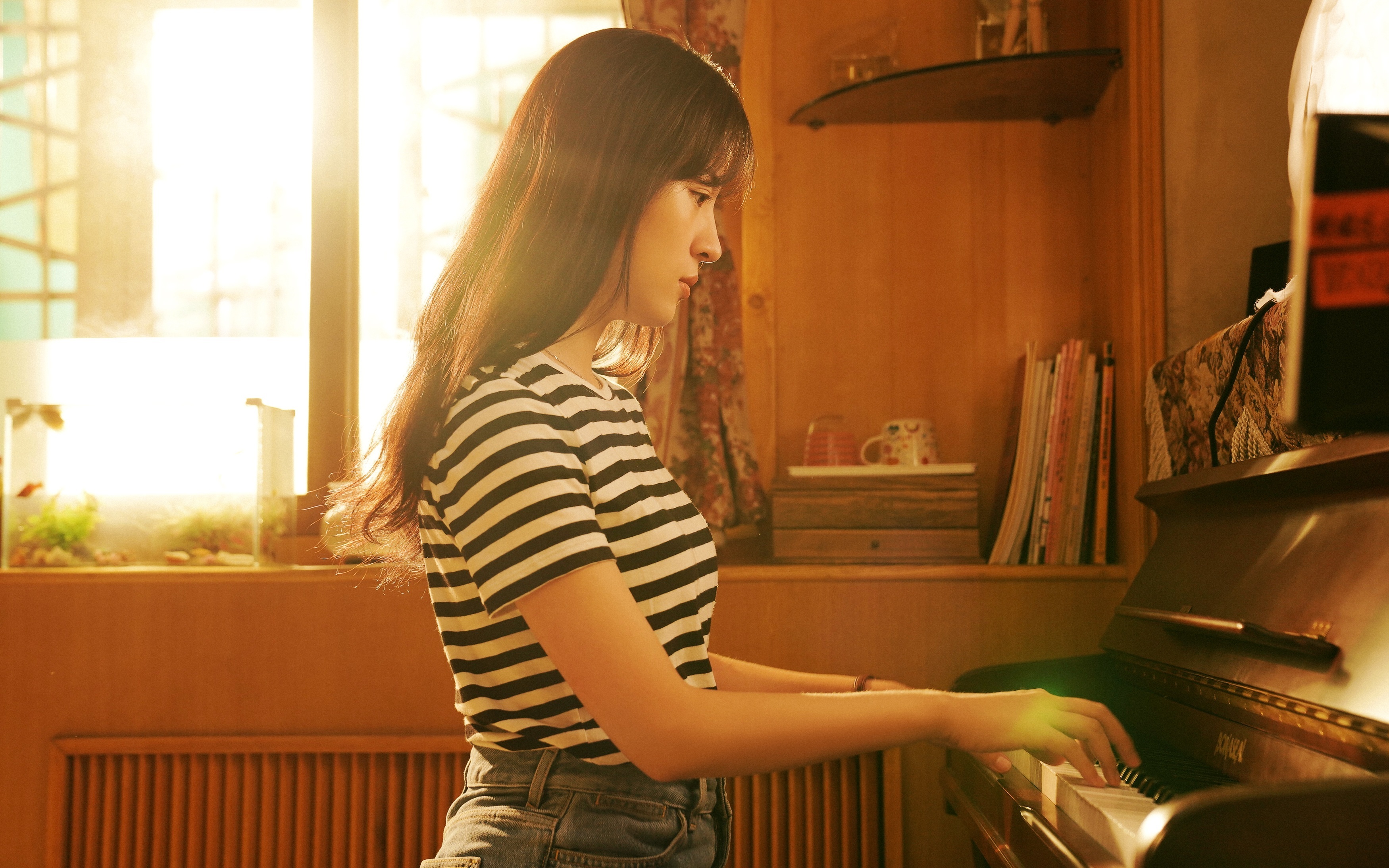 钢琴是丁木木毕生的热爱。