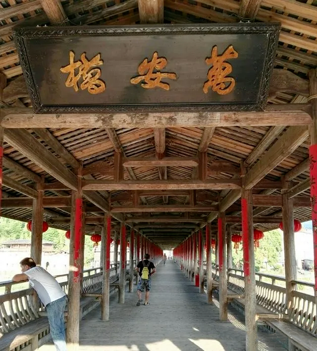 被烧毁的中国最长木拱廊桥到底有没有900年？