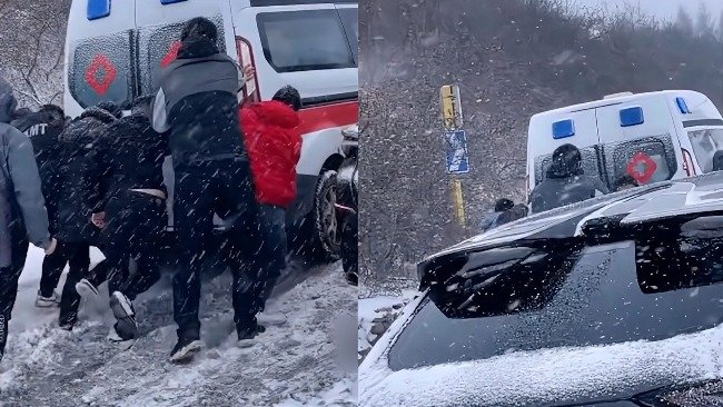 河北大雪一救护车打滑被困 过路司机纷纷伸出援手