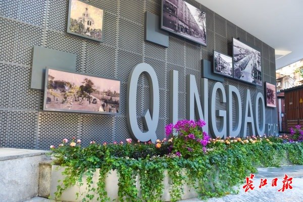 幕墙上挂满青岛路的老照片。 记者许魏巍 摄