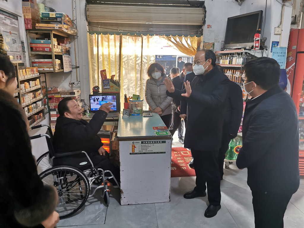 中国残联党组书记、理事长周长奎一行深入驻马店市调研残疾人工作