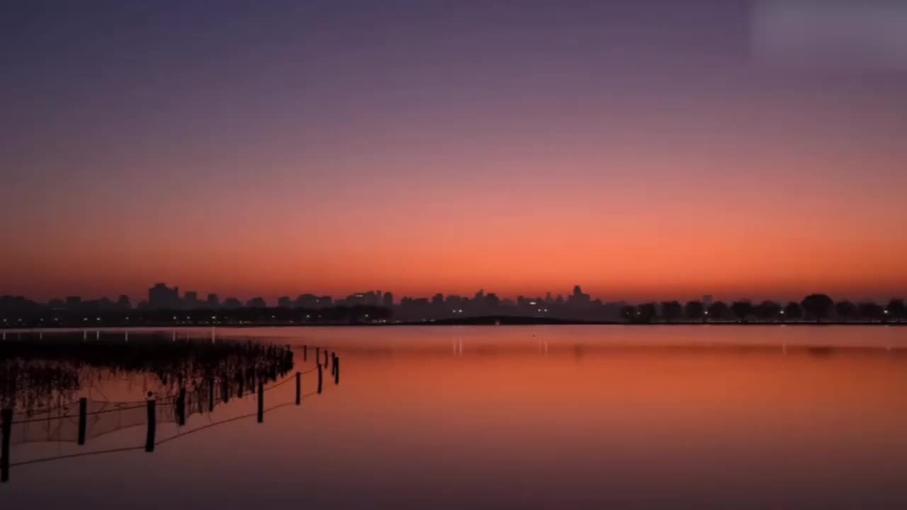 西湖日出美出天际