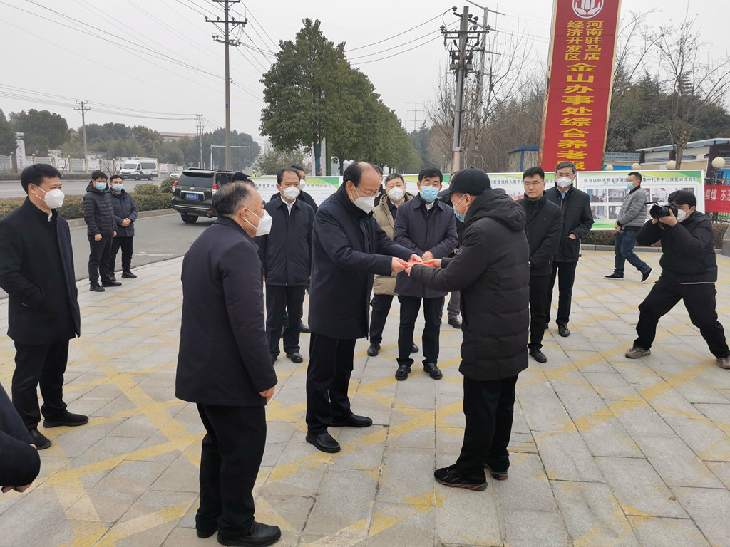 中国残联党组书记、理事长周长奎一行深入驻马店市调研残疾人工作