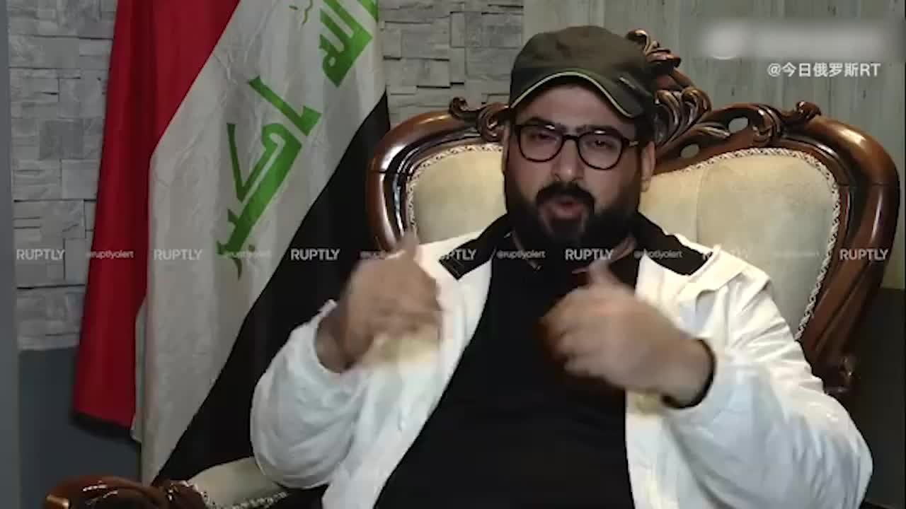 向小布什扔鞋的伊拉克记者发声：我想看小布什接受审判