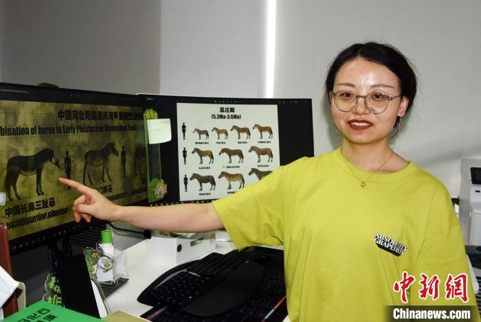 马姣介绍团队最新研究成果。　<a target='_blank' href='/'>中新社</a>记者 孙自法 摄